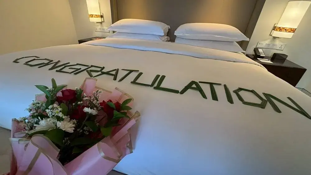 シェラトン・バリ・クタ・リゾートで無料アップグレードされたスイートルームのベッド